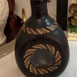 Vintage Hand-Carved Leather Wrapped Glass Decanter with Woven Detail